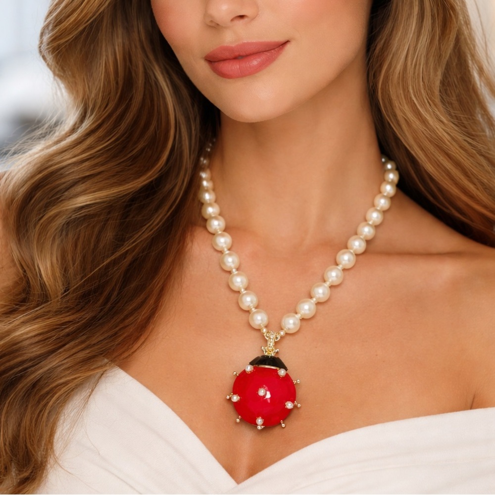 Elegant Pearl Necklace with Red Pendant